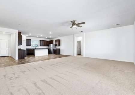 The spacious family room is open to the kitchen.