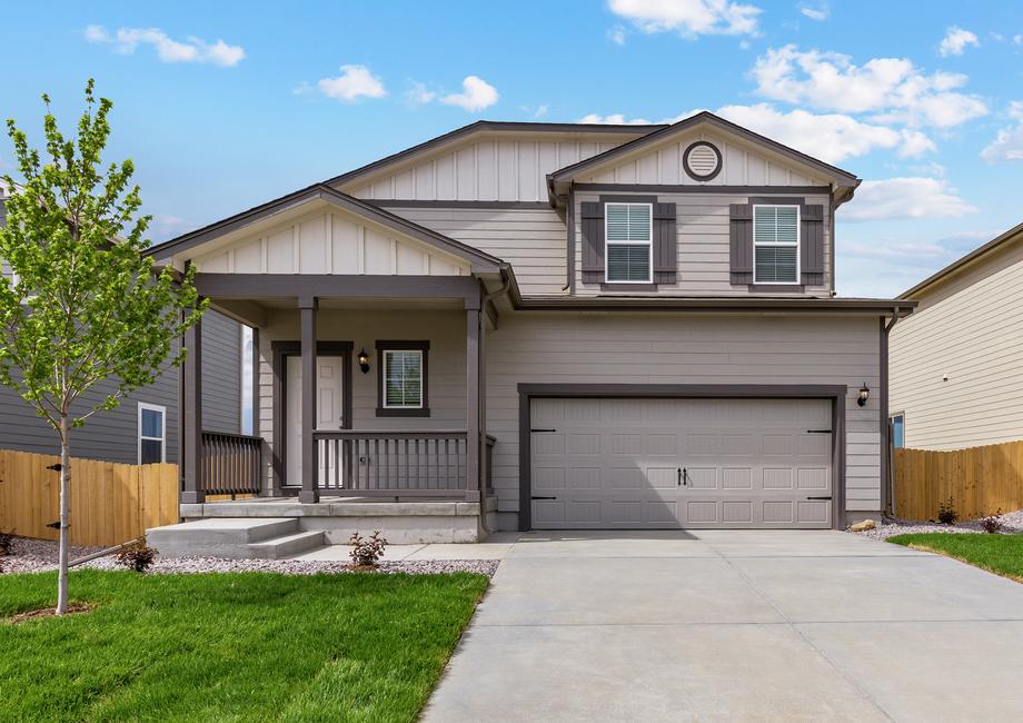 Exterior of the St. Vrain floor plan with a covered front porch and two-car garage.