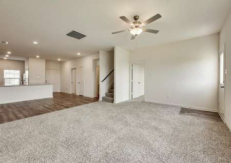 This home offers a spacious family room that is open to the dining room.
