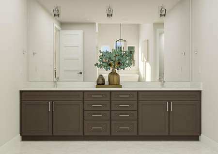 Rendering of the master bathroom's dual
  vanities featuring brown cabinetry, quartz countertops, modern fixtures and  decorative flowers.