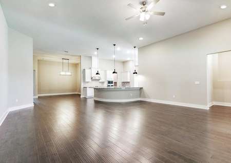Open concept floor plan provides easy access to the living room, kitchen and formal dining room.