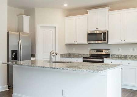 Hartford kitchen with granite countertops, stainless steel appliances, and white cabinets