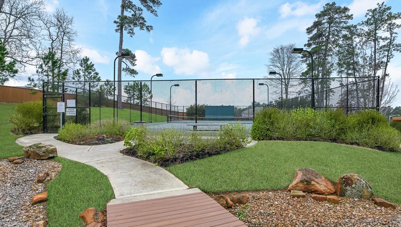 Wedgewood Forest park with tennis court and picnic table during daytime