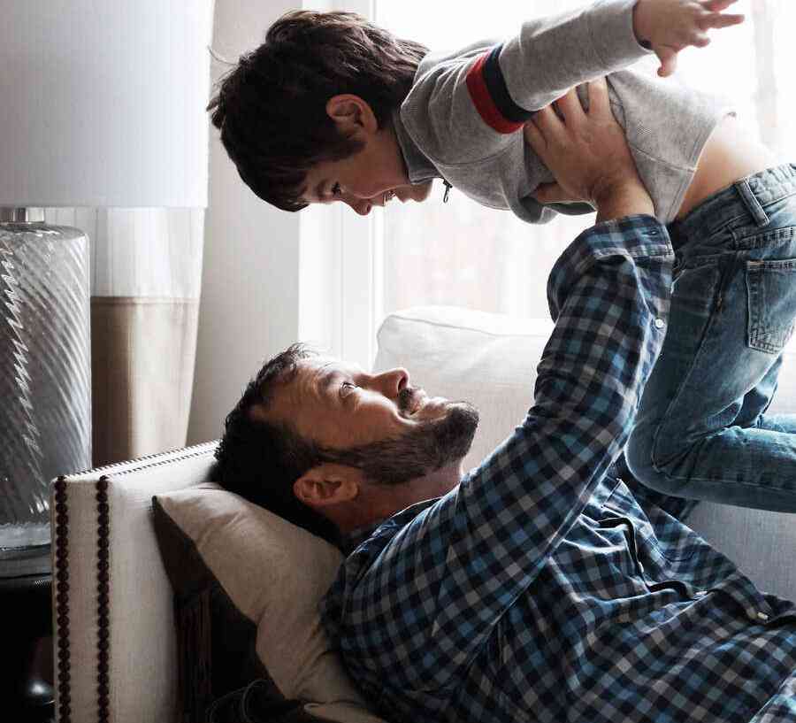 Family time on couch in living room