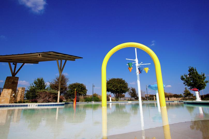 Close up photo of the swimming pool and splash pad at Blanco Vista.