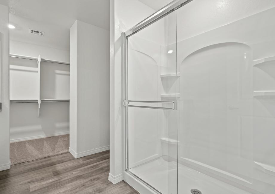 Master bathroom with a step in shower