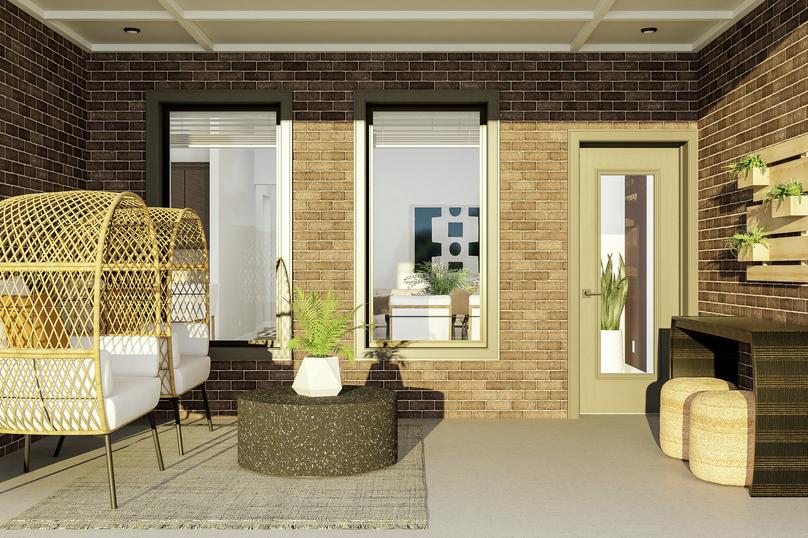 Rendering of the covered patio with a
  view into the open-floor plan. The patio features natural furniture and
  dÃ©cor.