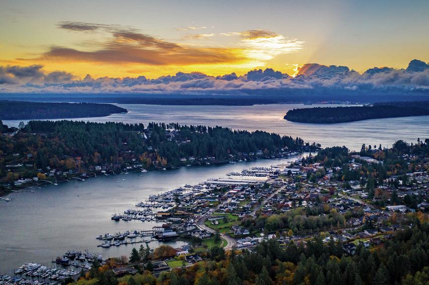 Tacoma, Washington Gig Harbor at sunrise showing water inlets, town, and forest area