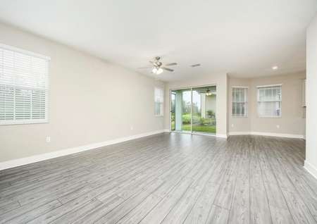 The family room is spacious and has easy access to the back patio