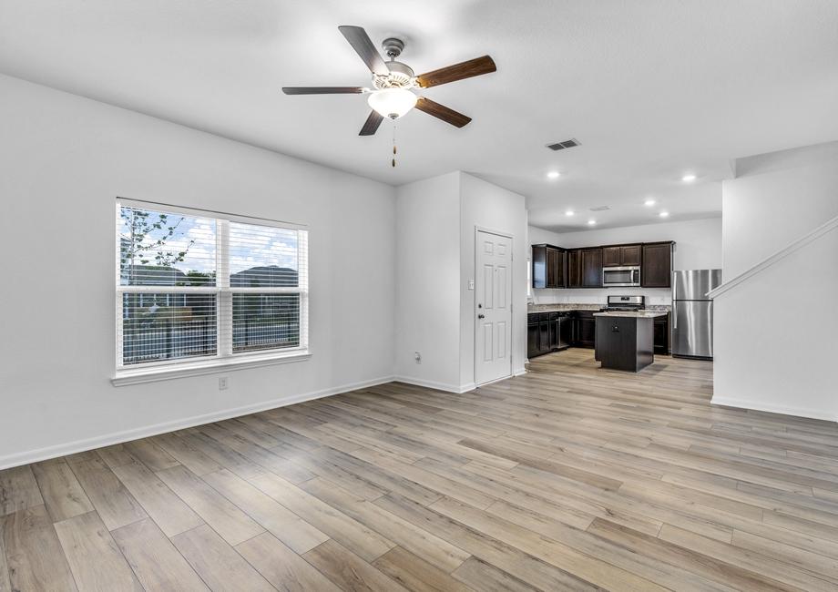 Open layout of the main floor with a large living room and chef-ready kitchen.