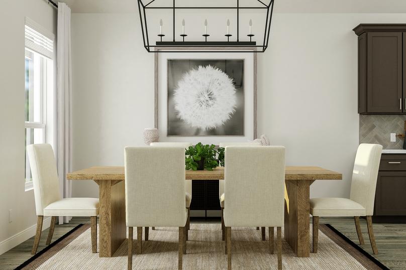 Rendering of the beautiful dining space
  in the Liberty floor plan. The room has large windows, wood-look flooring and
  decorative lighting and the kitchen is in the background.Â 
