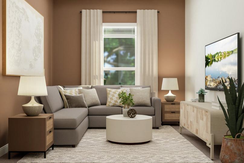Rendering of a flex space furnished with
  a sectional couch, two side tables, coffee table and media cabinet.