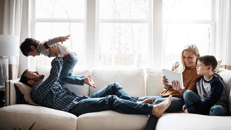 Family time on couch in living room