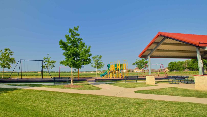 Bunton Creek new home community park with picnic areas, walking paths, and children's playground