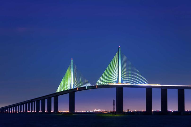 Tampa, Florida Saint Petersburg Skyway Bridge at night with suspension wires lit up green