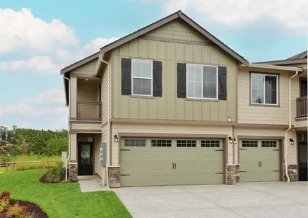 Beautiful two story townhome with siding and a balcony