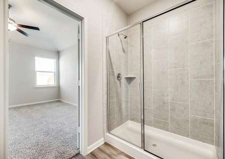 The master bath has a large, walk-in shower.