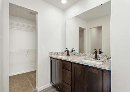 The master bathroom has a double sink vanity