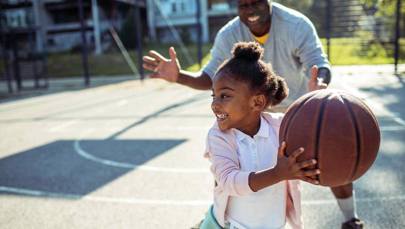 Girl Playing Basketball