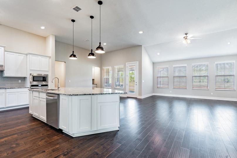 Open concept floor plan with a stunning kitchen and a large living room. 