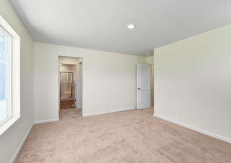 Master bedroom with carpet