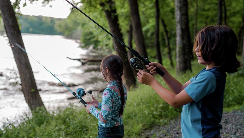 Boy and girl fishing