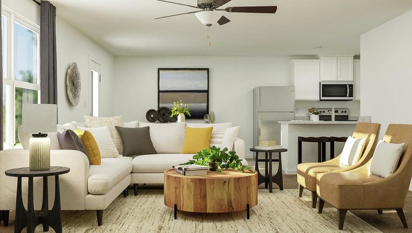 Rendering of living room with view from
  kitchen area with large window, cabinet storage and tv above storage.