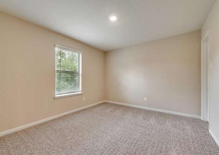 Ozark bedroom with window, carpet and ceiling light