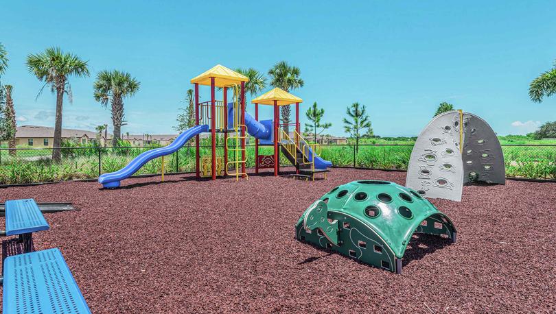 Celebration Pointe community playground with various obstacles for children