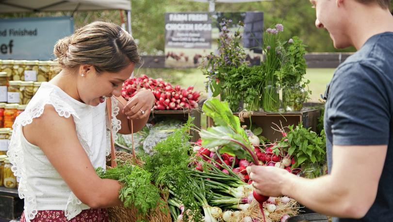 Young couple shopping at a farmer's market