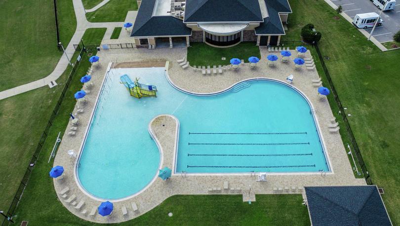 Drone view of the clubhouse center and the pool area in the Poinciana community.