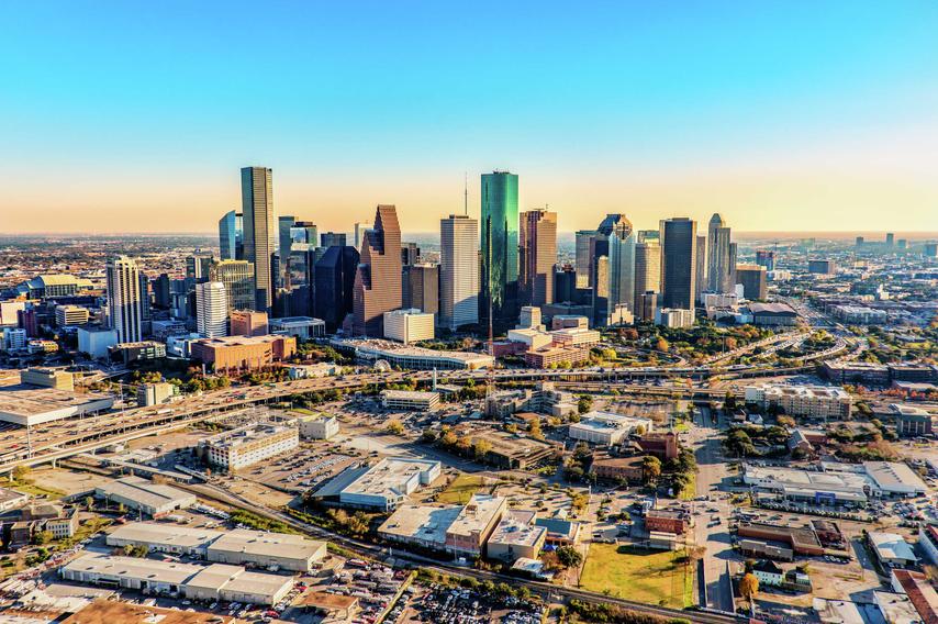 Downtown Houston Texas shot near dusk from an altitude of about 1200 feet over the city.