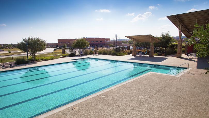 Junior Olympic-sized swimming pool at Blanco Vista community.