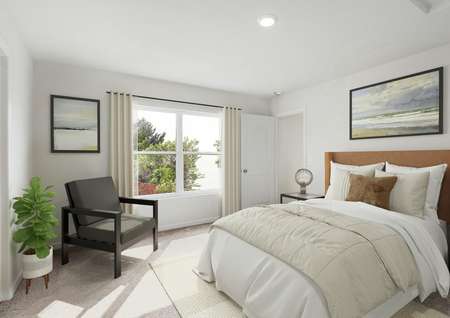 Photo of a primary bedroom with carpet and a large window, furnished with a queen bed, end tables, a chair and a plant.