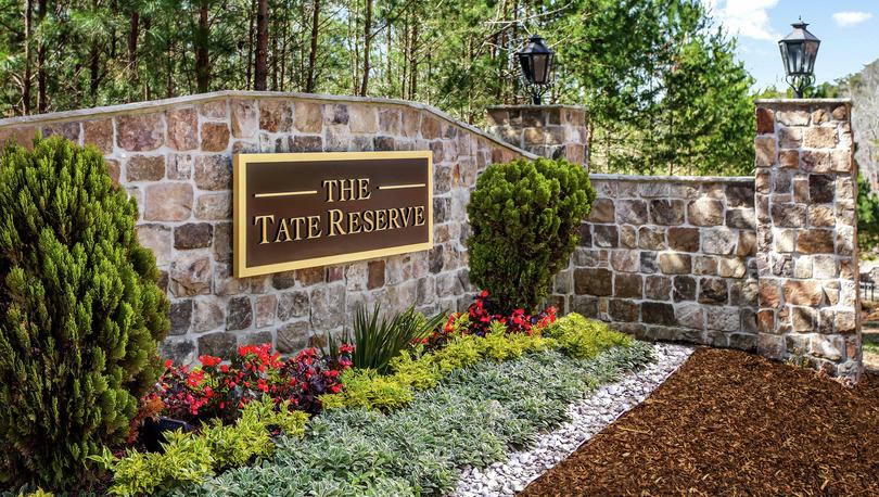 Stone monument with landscaping at The Tate Reserve in Ball Ground, GA.