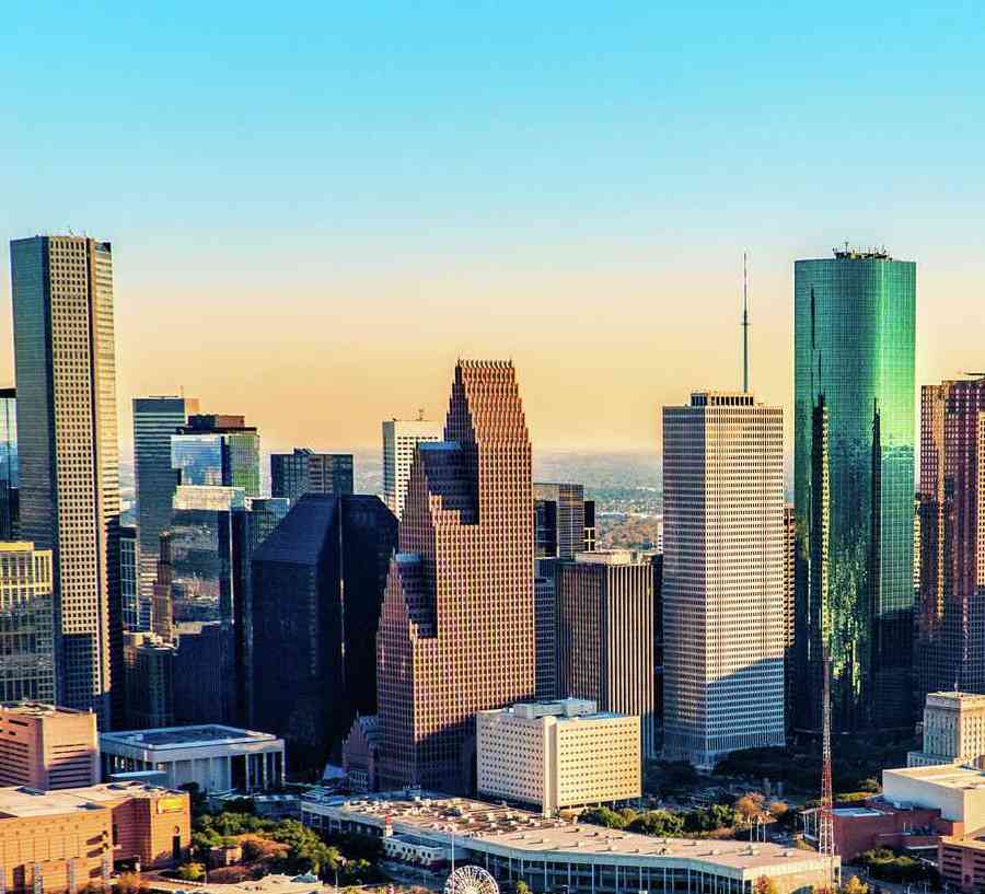 Downtown Houston Texas shot near dusk from an altitude of about 1200 feet over the city.