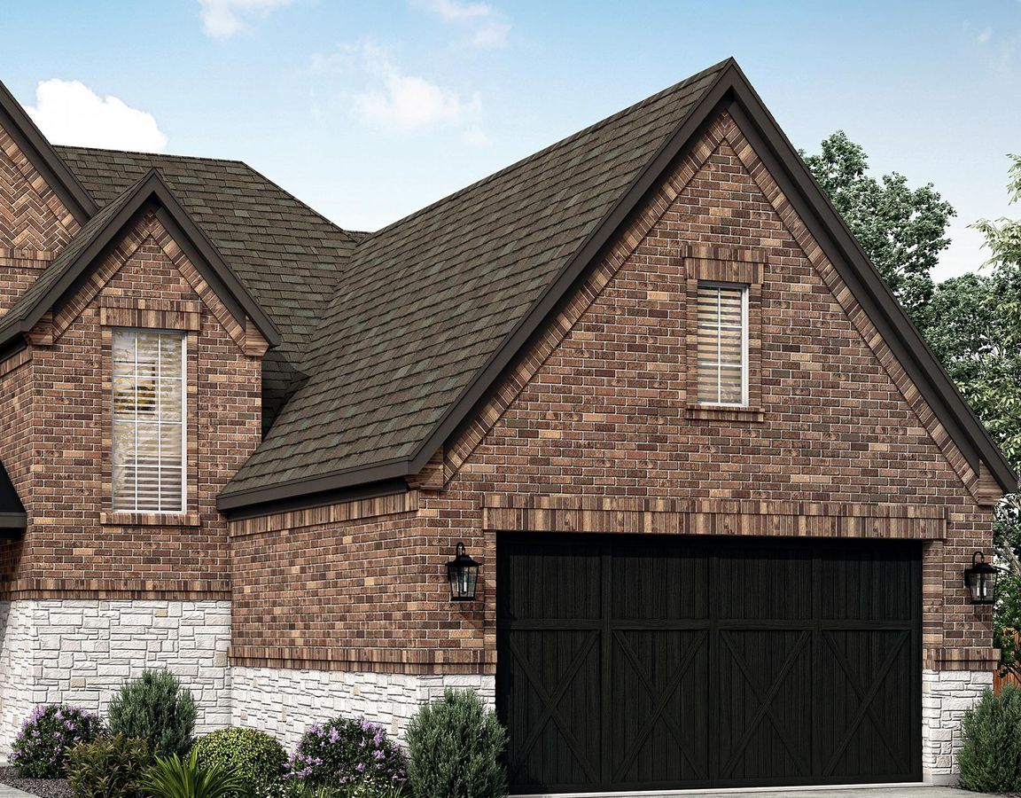 The Naomi plan has an luxurious brick and stone exterior.