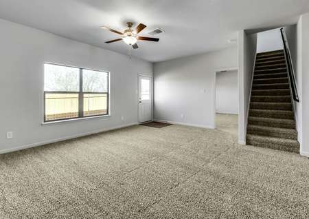 The open family room is spacious and large enough for all your gatherings. 