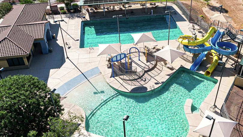 Fun-filled water park with a lap pool, swimming pool, 2 water slides, and a splash area.