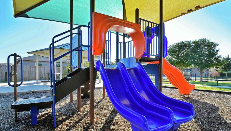 Luckey Ranch new home community park with kid's playground and sunshade