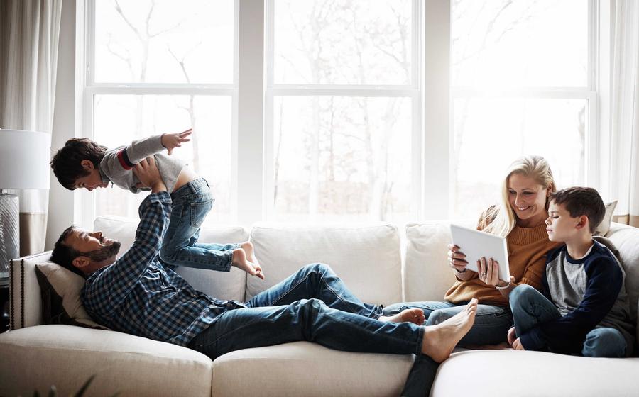 Family time on couch in living room