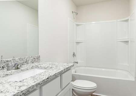 The spare bathroom in the Burke is spacious and has a large vanity