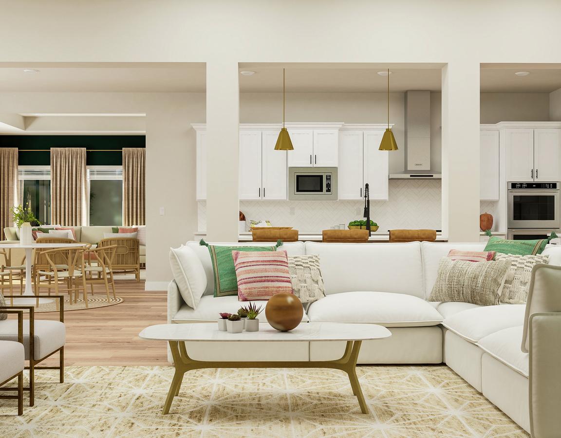Rendering of the living room showing a
  white couch and coffee table, matching accent chairs, a view of the secondary
  living room as well as dining nook and kitchen in the background.
