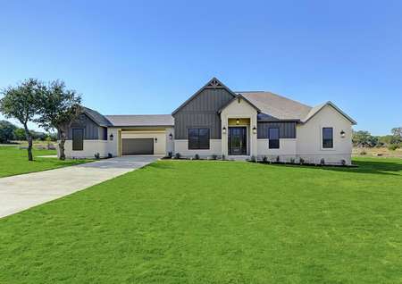 The beautiful Garza plan has light stucco and dark siding details.