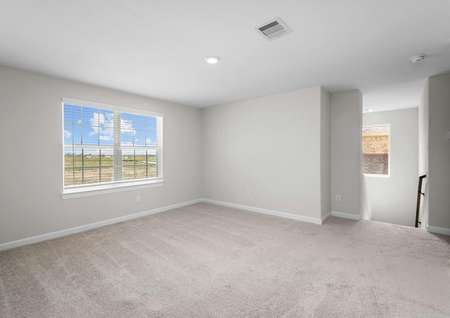 Upstairs game room with carpet