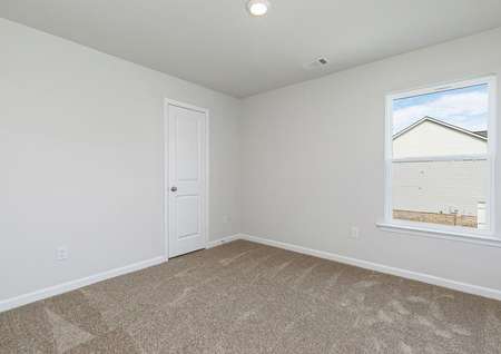 The Avery's spare bedrooms are spacious with plenty of natural light.