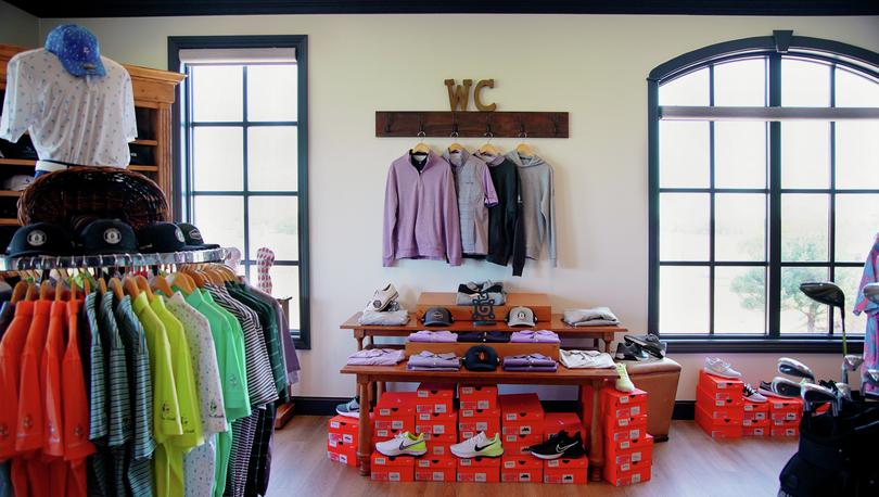 Shirt and shoe display at Winter Creek's Pro Shop.