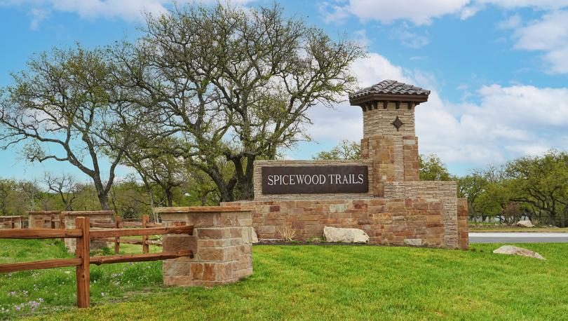 Stone Spicewood Trails monument.