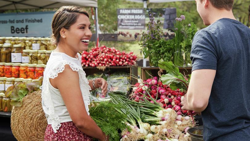 Couple at a Farmer's Market.