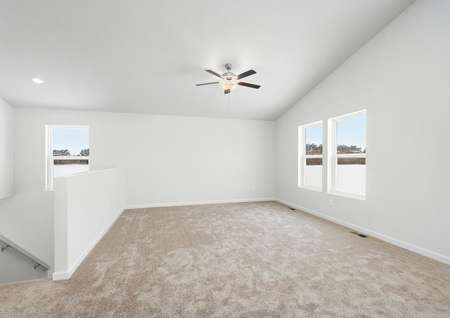 The family room is spacious with large windows